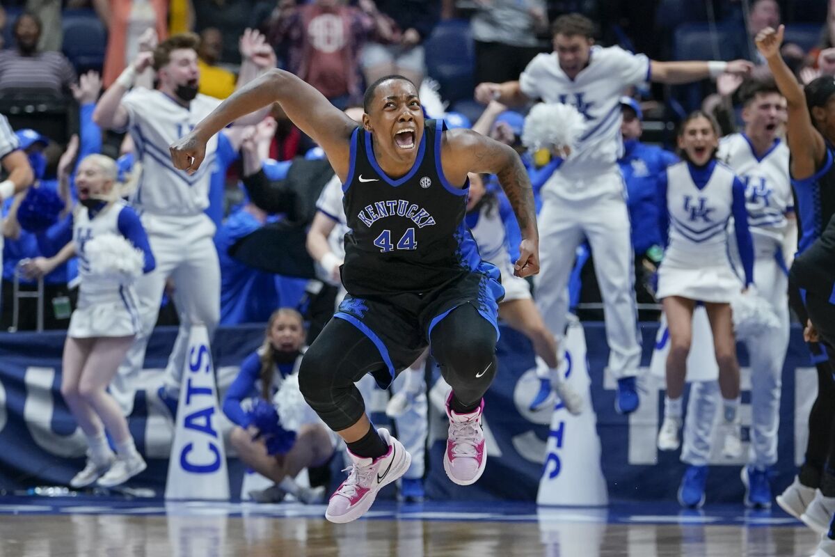 Kentucky's Dre'una Edwards (44) celebrates after making the winning shot to beat South Carolina in the NCAA women's college basketball Southeastern Conference tournament championship game Sunday, March 6, 2022, in Nashville, Tenn. Kentucky won 64-62. (AP Photo/Mark Humphrey)