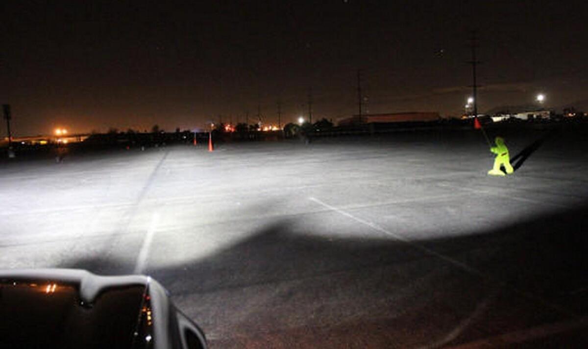 The Auto Club of Southern California tests headlights of a Mercedes-Benz at the Auto Club Speedway in Fontana.