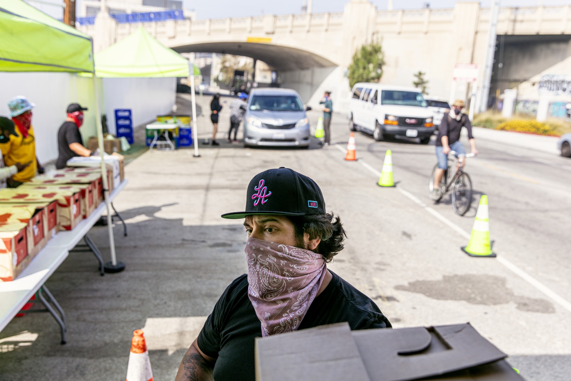 Othón Nolasco helps oversee food distributions in the Arts District.
