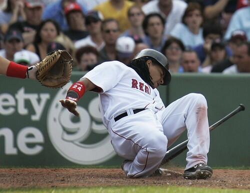 Manny Ramirez falls down after being hit by a pitch from Greg Jones in the eighth inning.