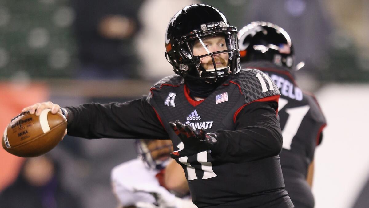 Cincinnati quarterback Gunner Kiel passes during a 54-46 victory over East Carolina on Thursday.