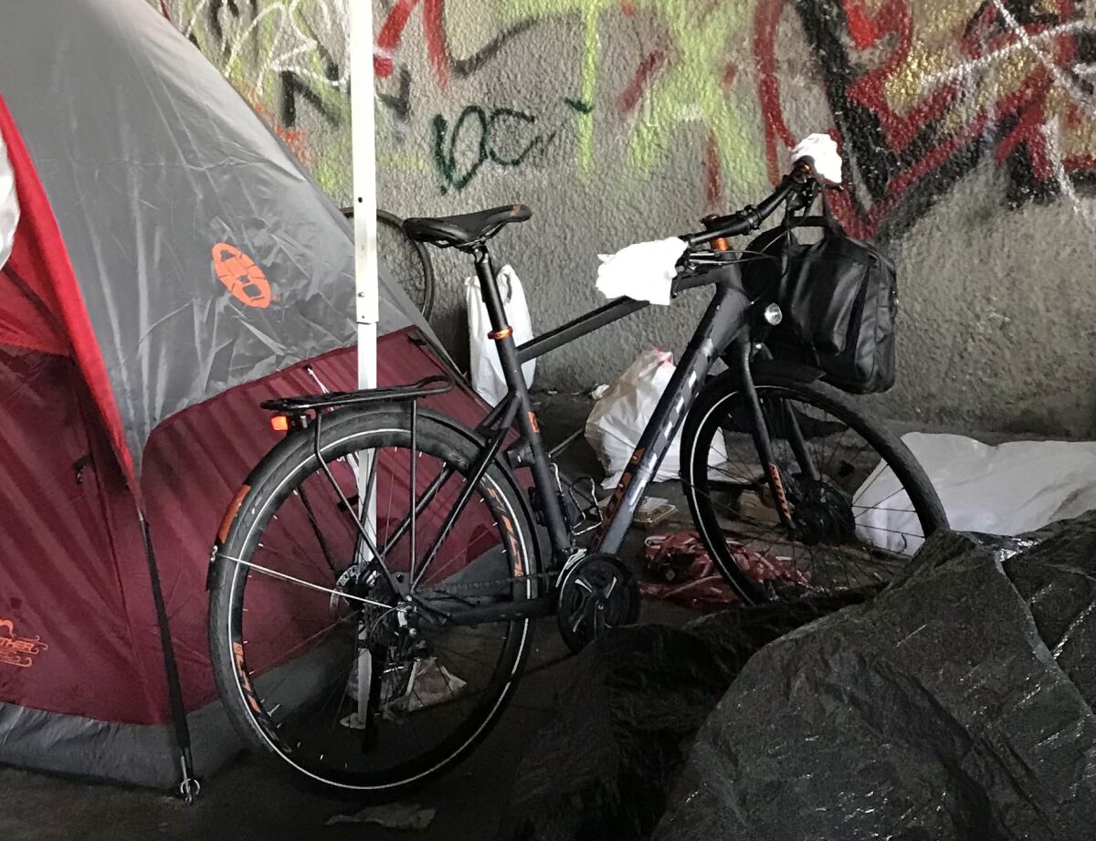 An expensive Scott bike at a homeless encampment. 