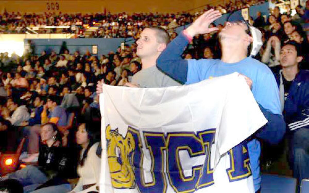 UCLA fans in Pauley Pavilion show disappointment while watching the Bruins play Florida in Indianapolis for the NCAA championship. The Gators won, 73-57.