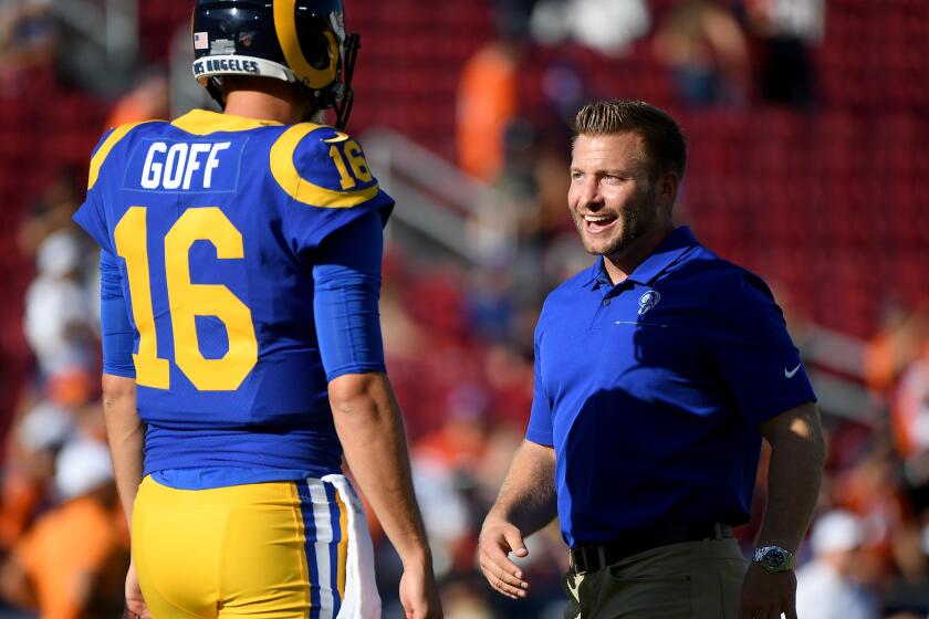 LOS ANGELES, CALIFORNIA - AUGUST 24: Head coach Sean McVay of the Los Angeles Rams laughs with Jared Goff #16 before a preseason game against the Denver Broncos at Los Angeles Memorial Coliseum on August 24, 2019 in Los Angeles, California. (Photo by Harry How/Getty Images)