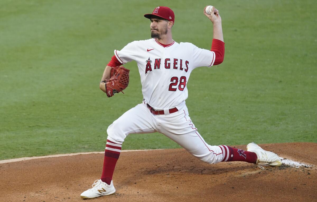 Angels starting pitcher Andrew Heaney throws during the first inning of a 4-3 win over the Texas Rangers.