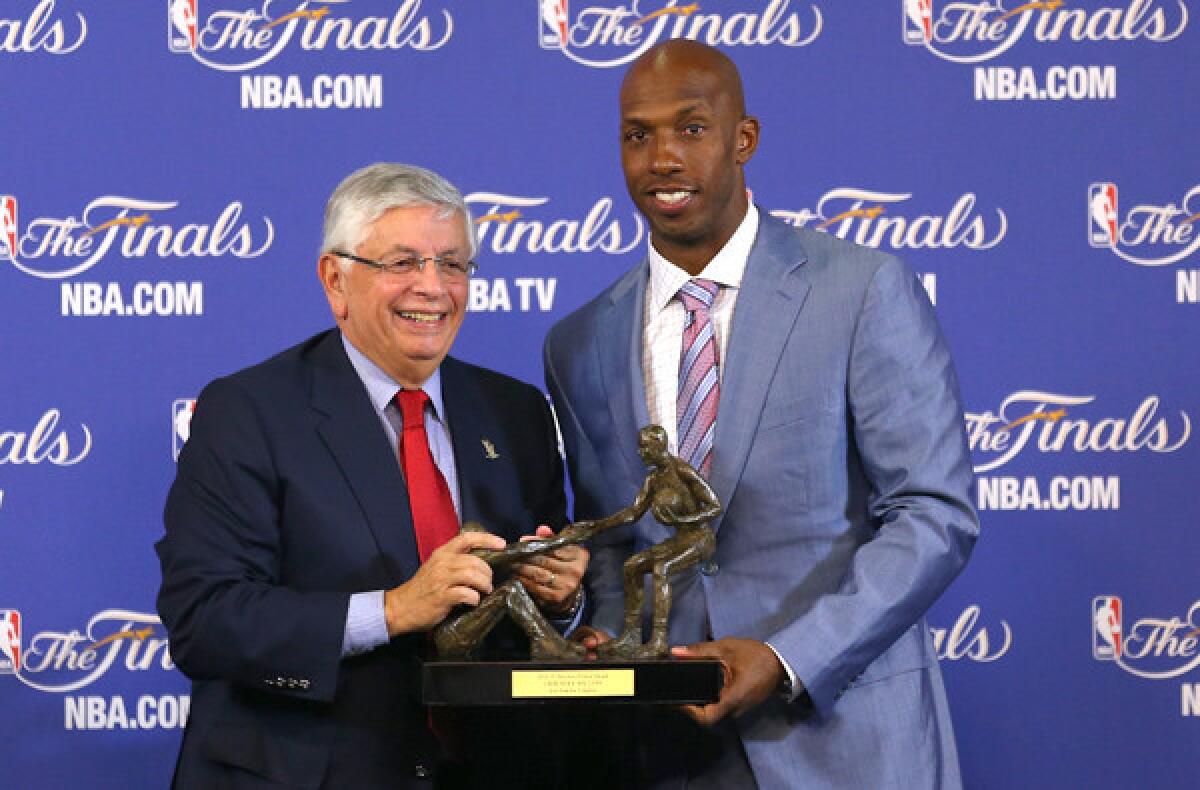 NBA Commissioner David Stern presents Clippers guard Chauncey Billups with the Twyman-Stokes Award on Sunday evening in Miami.