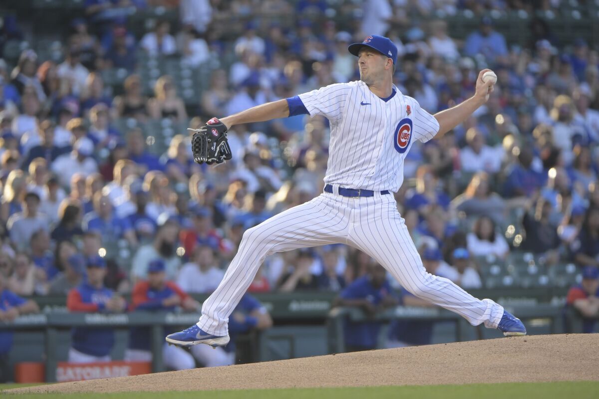 Chicago Cubs starting pitcher Drew Smyly throws against the Milwaukee Brewers during the first inning in the second game of a baseball doubleheader, Monday, May 30, 2022, at Wrigley Field in Chicago. (AP Photo/Mark Black)