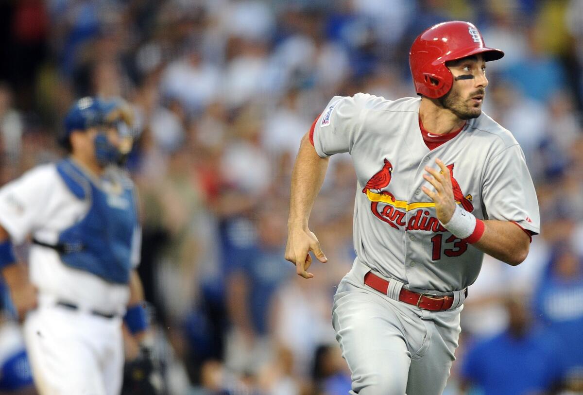 Cardinals third baseman Matt Carpenter watches his three-run double head toward right-center field in the seventh inning.