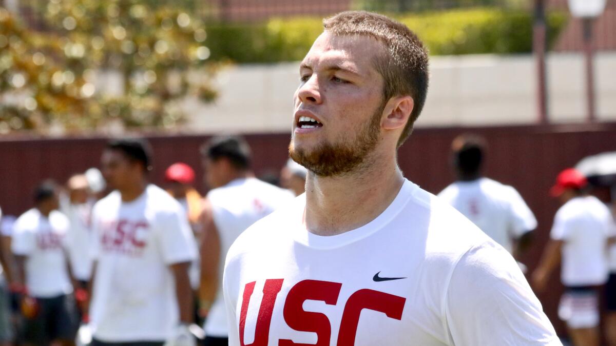 Roseville tight end Jimmy Jaggers performs at a USC football summer camp in June.