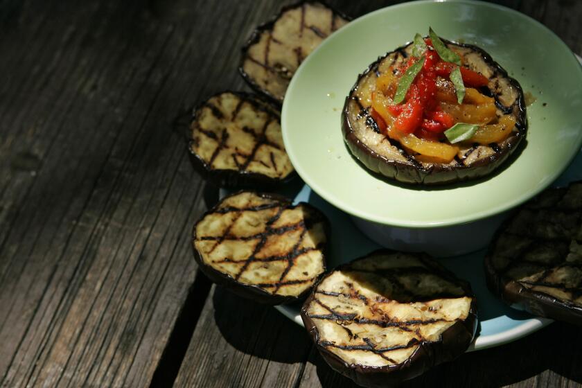 Grilled eggplant with red and yellow peppers