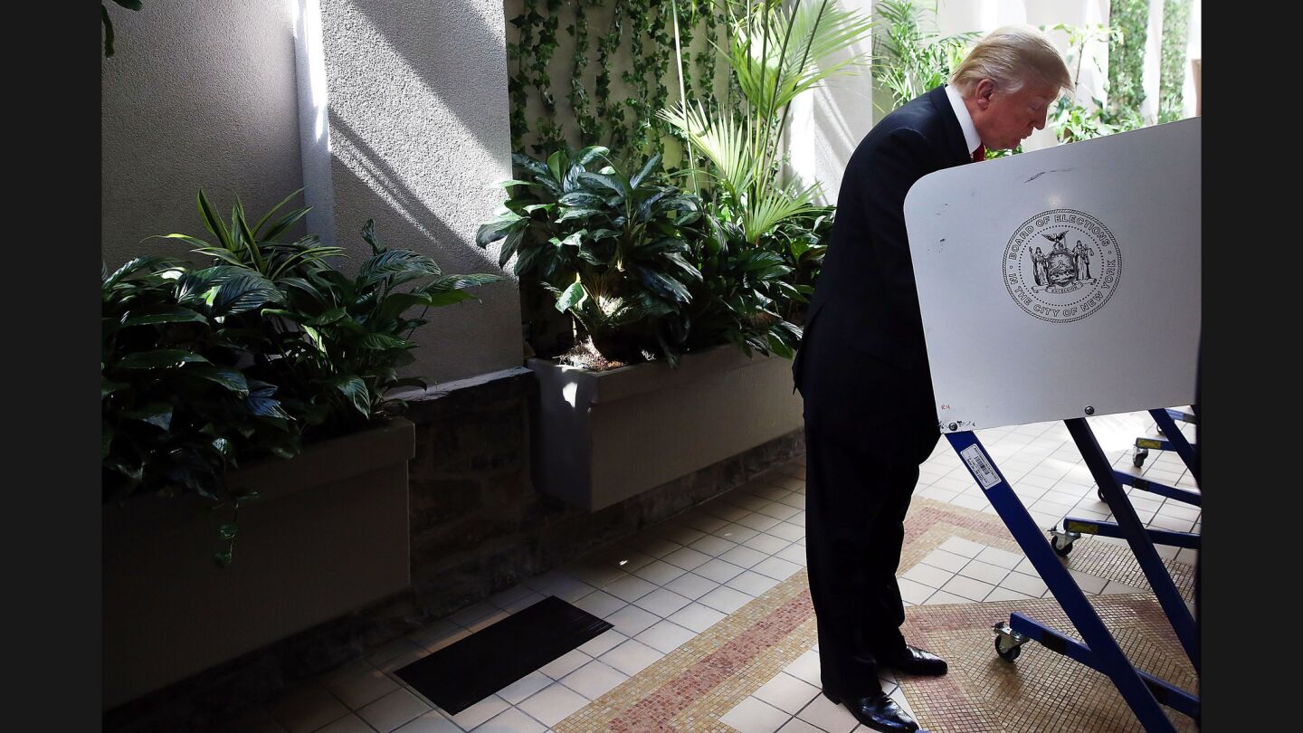 Donald Trump votes at his New York City polling station.