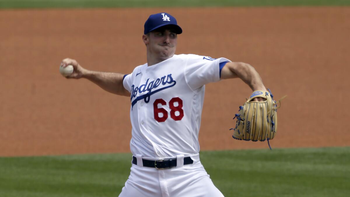 Ross Stripling throws for the Dodgers during a game against the Colorado Rockies on Aug. 23.