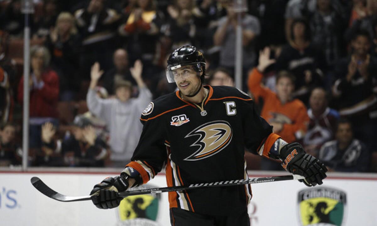 Ducks forward Teemu Selanne smiles during the third period of the team's 3-2 win over Colorado Avalanche on Sunday. Selanne, the Ducks' all-time leading scorer, hopes to end his stellar career with a memorable playoff run.