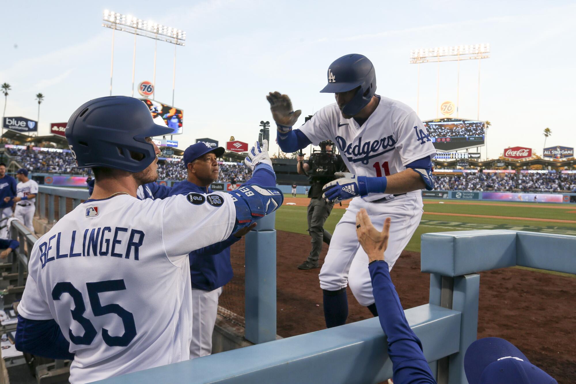 Dodgers' AJ Pollock celebrates with Cody Bellinger.