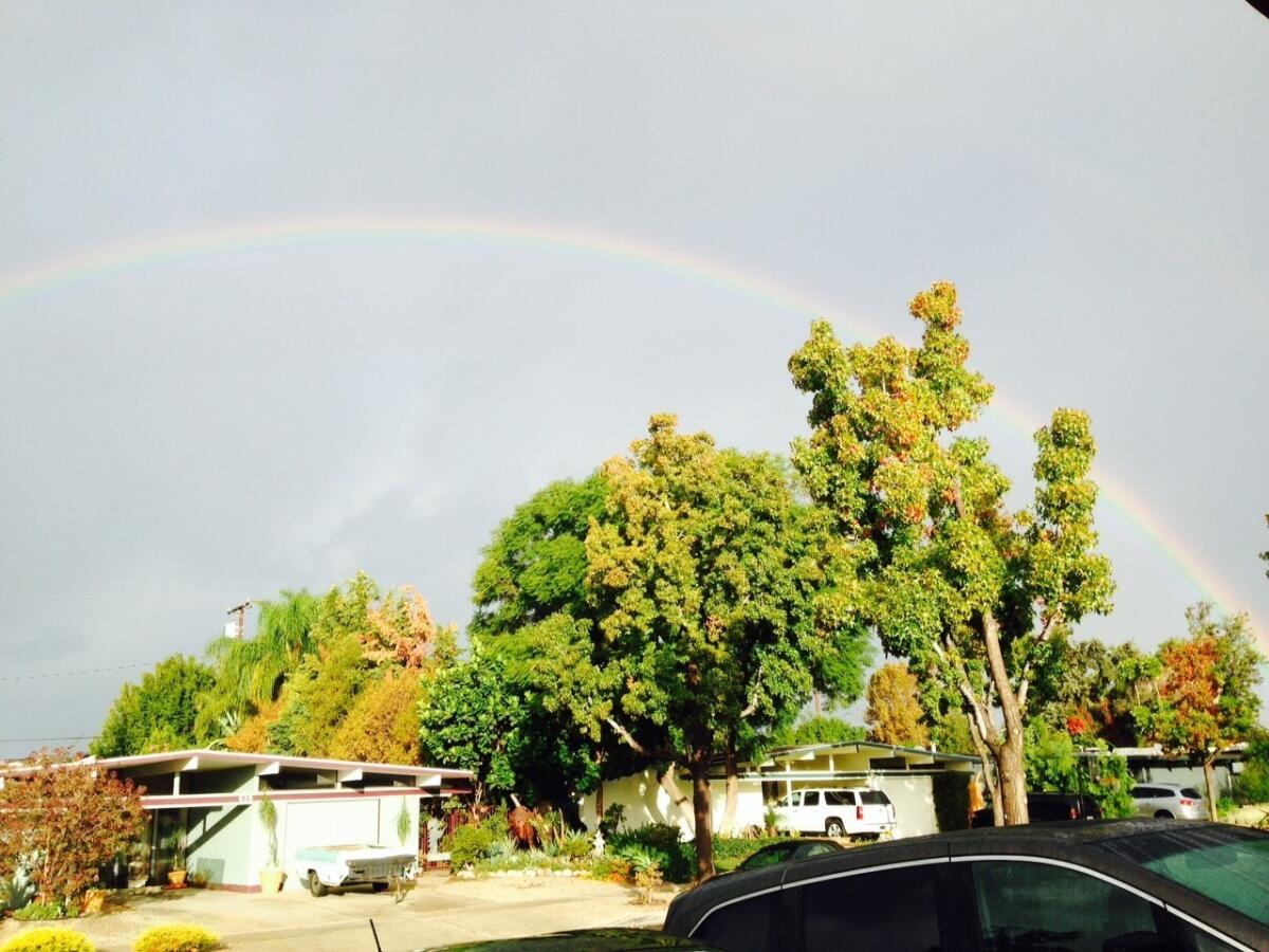 A sweeping rainbow in Orange County was among those created by ideal conditions.