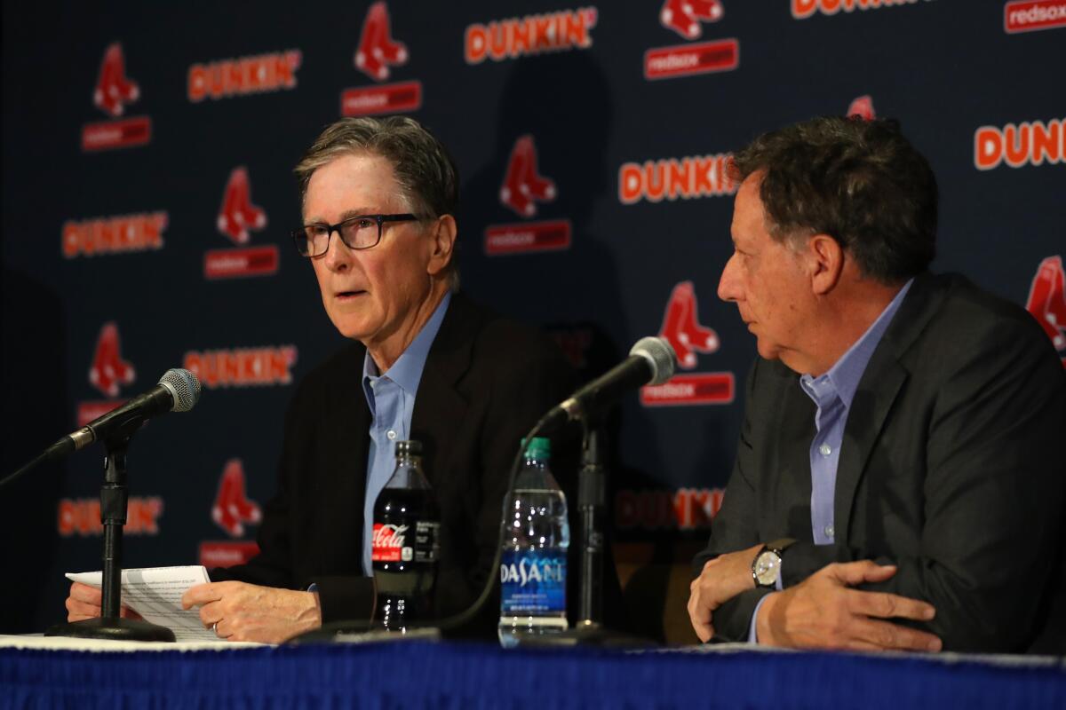 Boston Red Sox Owner John Henry addresses the firing of manager Alex Cora during a news conference on Jan. 15.
