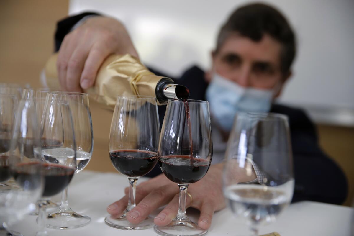 Wine glasses being filled