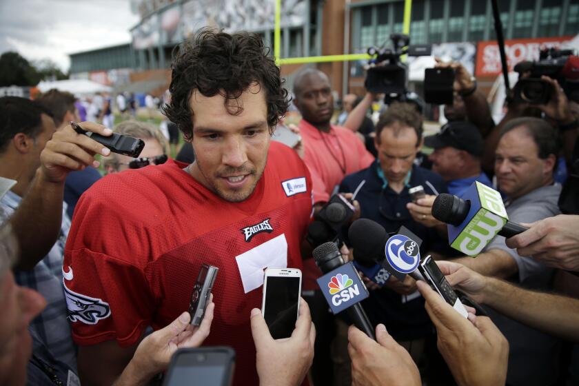 Eagles quarterback Sam Bradford speaks with members of the media after a training camp practice on Aug. 20.