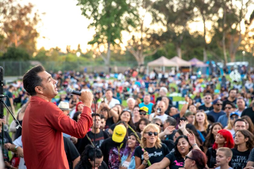 Concertgoers at Mile Square Regional Park watch Sweet and Tender Hooligans perform in 2019.