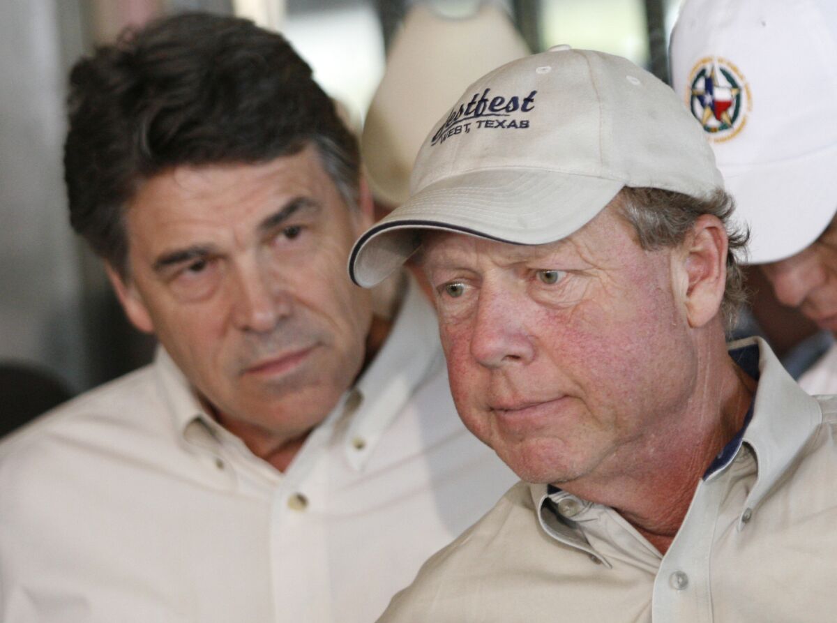 Mayor Tommy Muska, right, was grim during a news conference with Texas Gov. Rick Perry in West, Texas, on April 19.