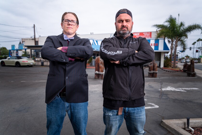 Damian Martin, left, and Elliot Lewis at a property on Costa Mesa's 17th Street they leased for a cannabis dispensary.