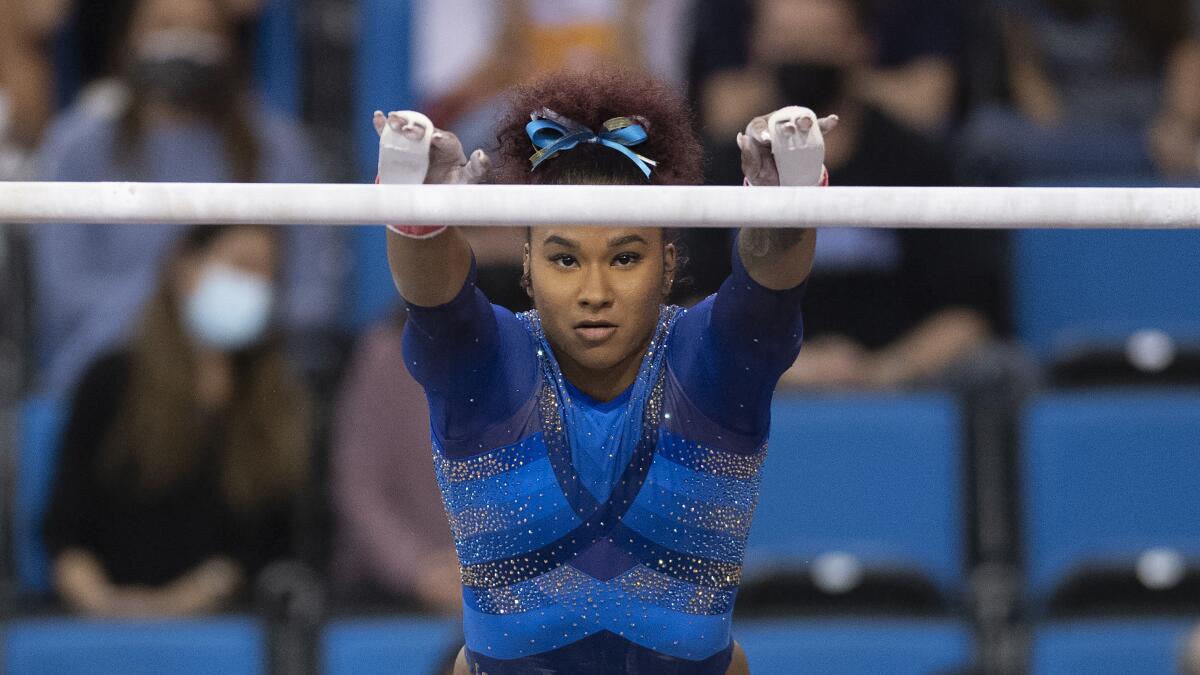 UCLA's Jordan Chiles competes on the uneven parallel bars 