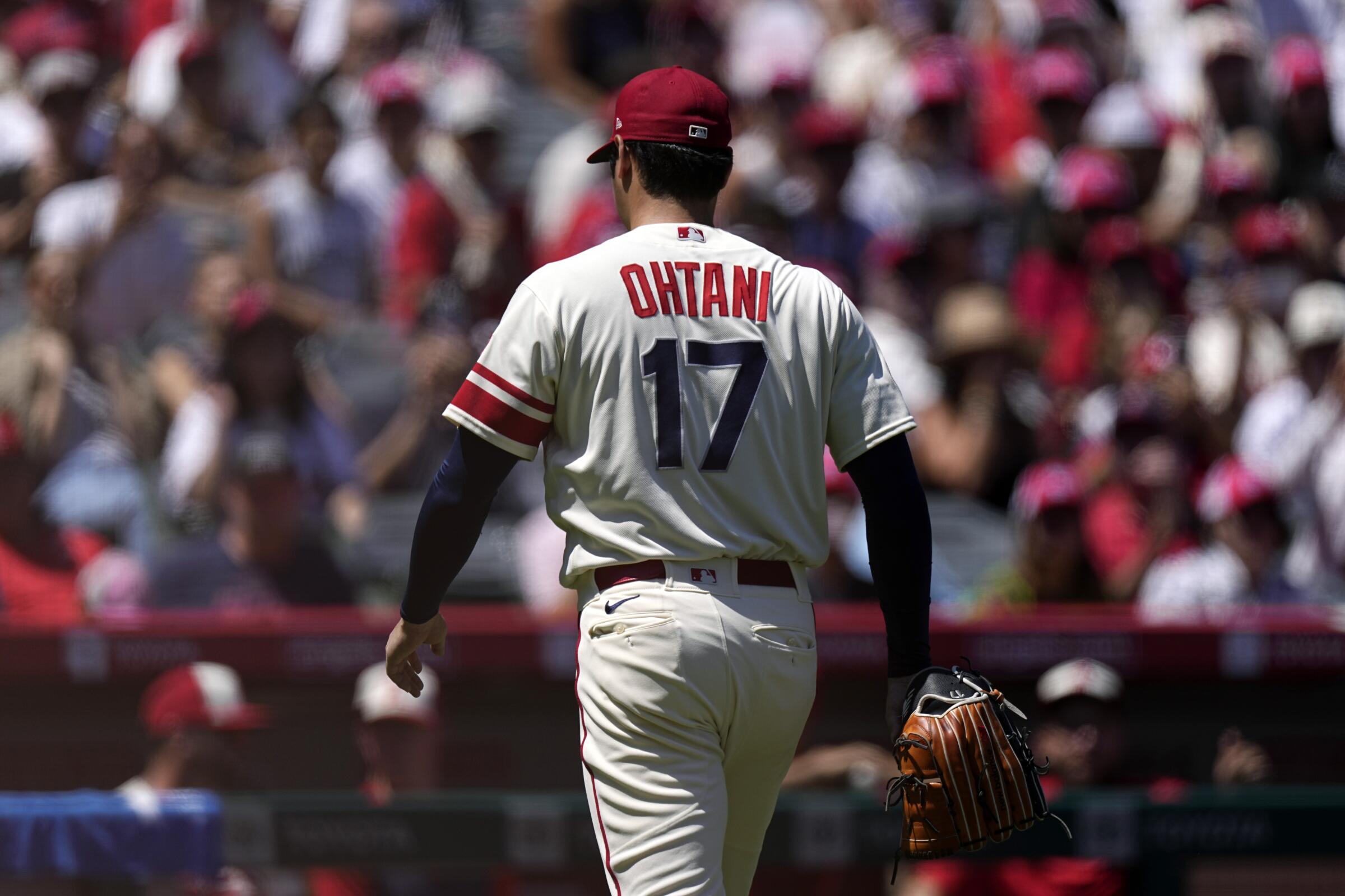 Ohtani has torn UCL in pitching elbow, Trout heads back to IL