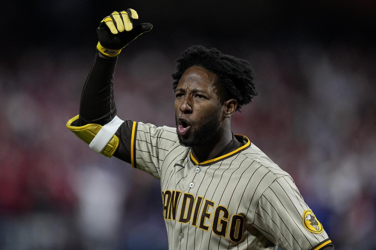 San Diego Padres' Jurickson Profar reacts after striking out during the ninth inning in Game 3 of the NLCS.