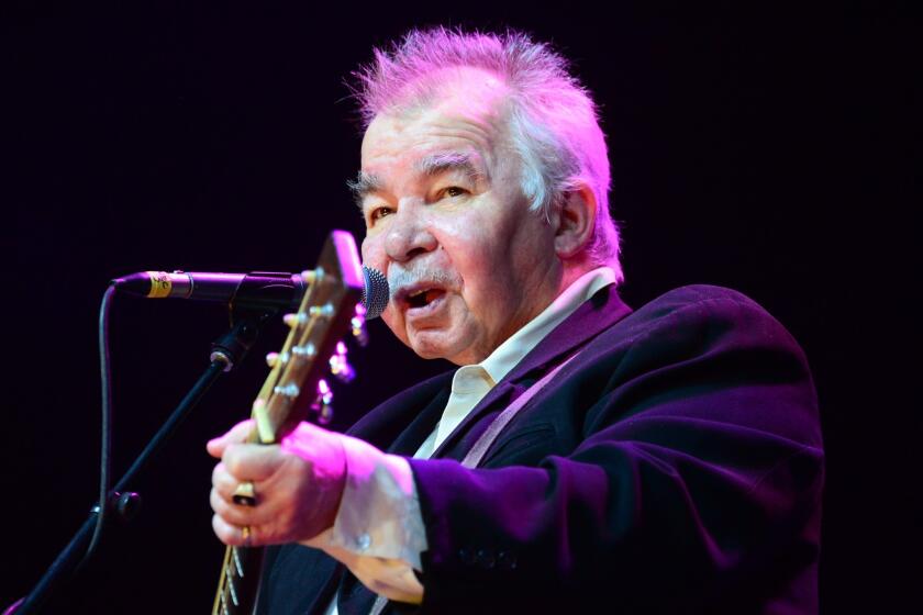 John Prine performs onstage Sunday at Stagecoach in Indio, Calif.