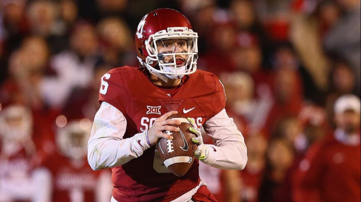Oklahoma quarterback Baker Mayfield looks to throw the ball during a game against Texas Christian.