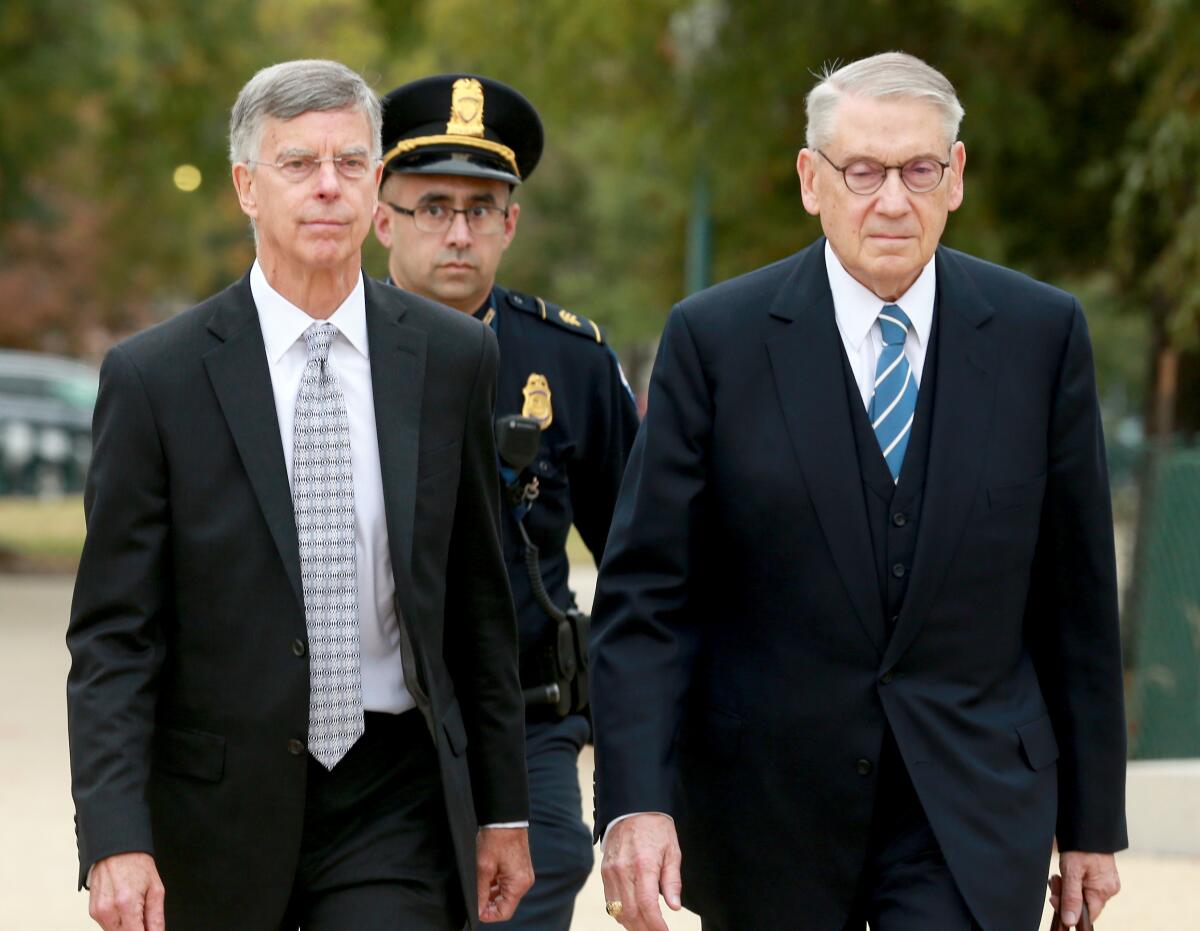William B. Taylor, left, the top U.S. diplomat to Ukraine, arrives at the Capitol on Tuesday to testify.