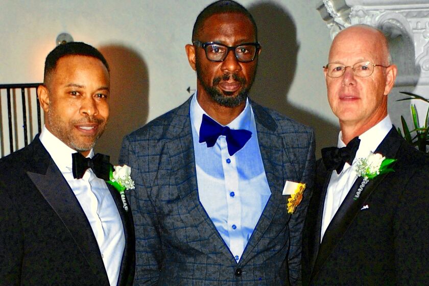 Timothy Dean, center, with friend Mark Chambers, left. Dean died in the West Hollywood apartment of Democratic donor and activist Ed Buck and the death has prompted a probe by homicide detectives. (Courtesy of Mark Chambers)
