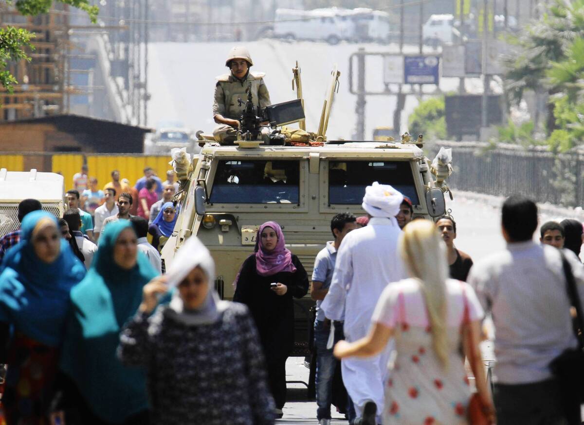 A soldier is deployed near Cairo's Nahda Square, where supporters of deposed Egyptian President Mohamed Morsi have set up camp to demand his reinstatement.