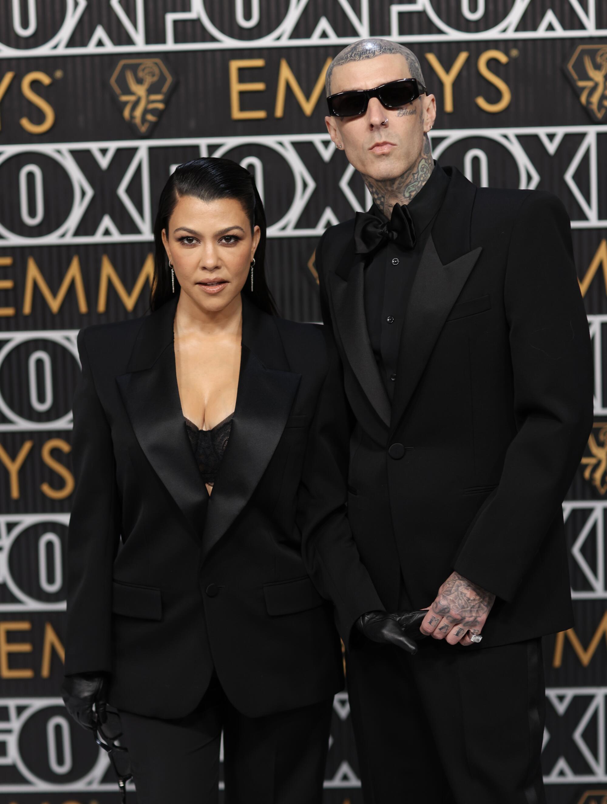 Kourtney Kardashian and Travis Barker on the Emmys red carpet. 