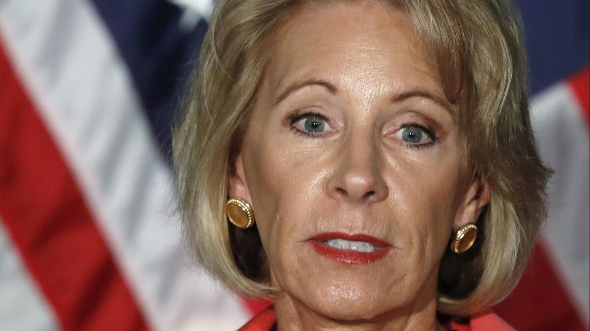 The family of Education Secretary Betsy DeVos, shown in September 2017, owns 10 vessels, including the 163-foot Seaquest.
