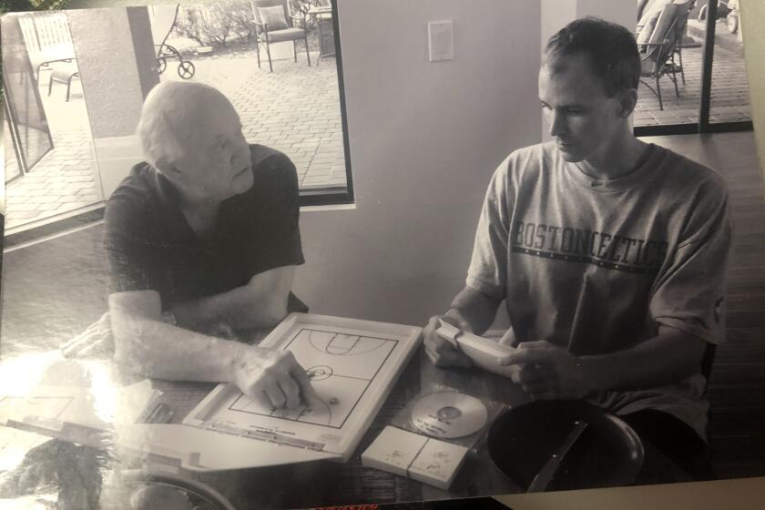 USC coach Andy Enfield with his father in 2012.