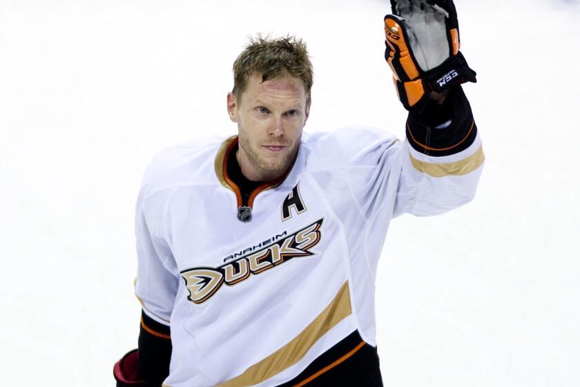 Now-retired Ducks center Saku Koivu waves to the crowd after a game against his former team, the Canadiens, in Montreal back in 2011.