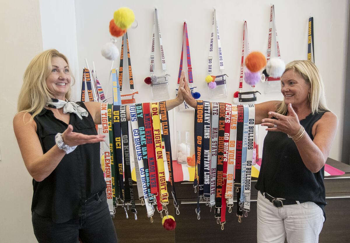 Kelly Wilson, left, and Ann Pender are the developers of Strap Lab, which is based in Newport Beach.