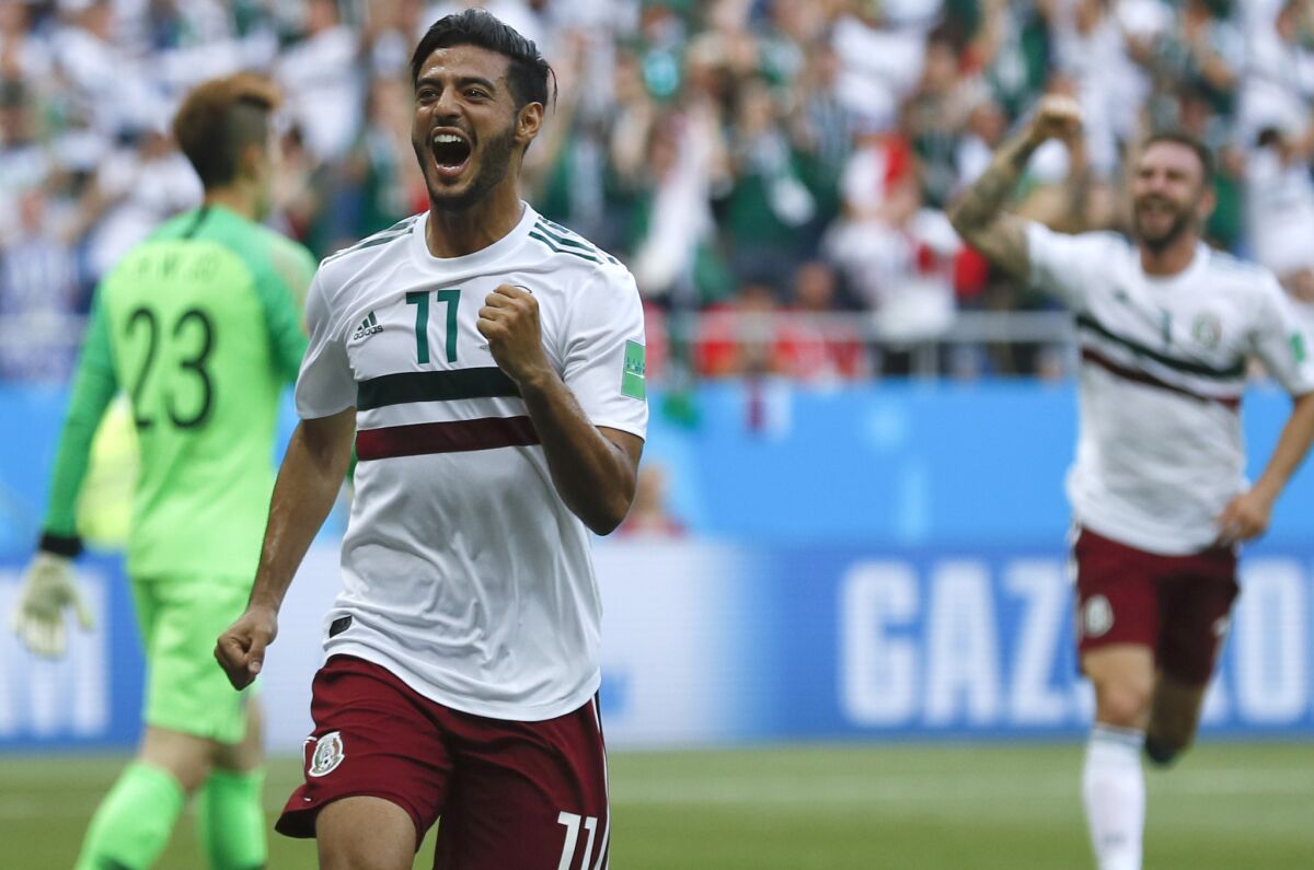 Mexico's Carlos Vela celebrates after scoring the opening goal during the group F match between Mexico and South Korea at the 2018 soccer World Cup in the Rostov Arena in Rostov-on-Don, Russia, Saturday, June 23, 2018.