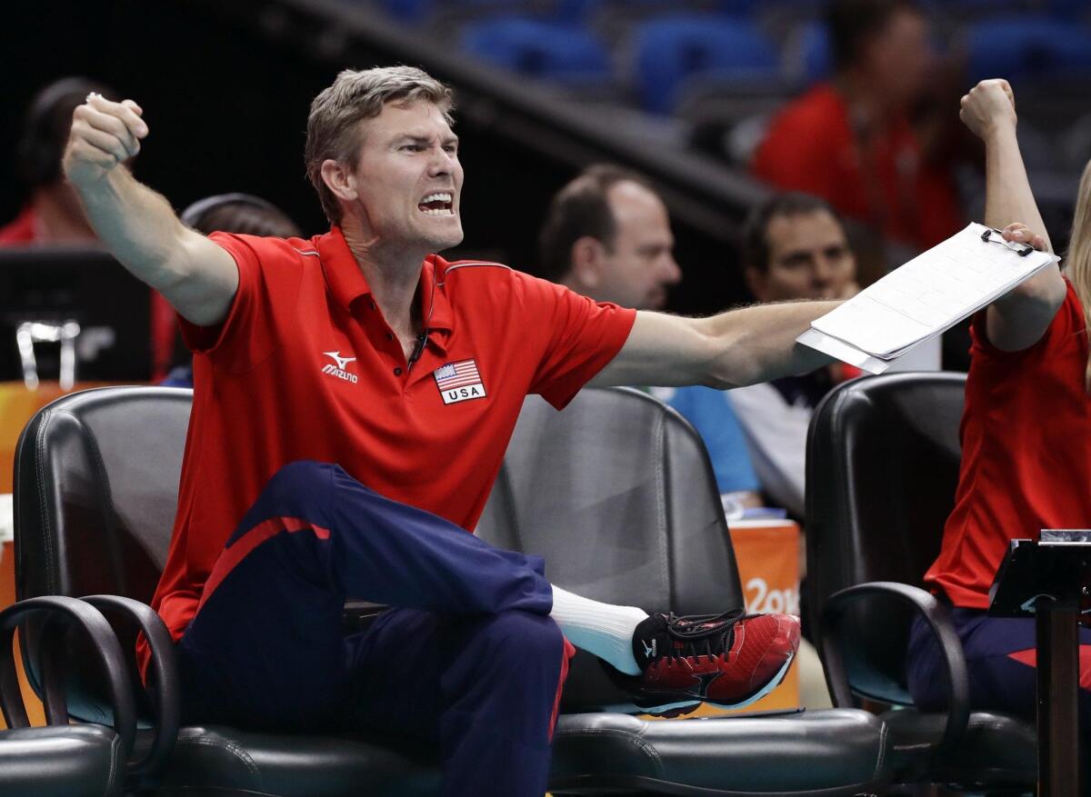 Matt Fuerbringer, an Estancia High alumnus who is an assistant coach with the U.S. men’s volleyball team, shouts instructions during a quarterfinal match against Poland.