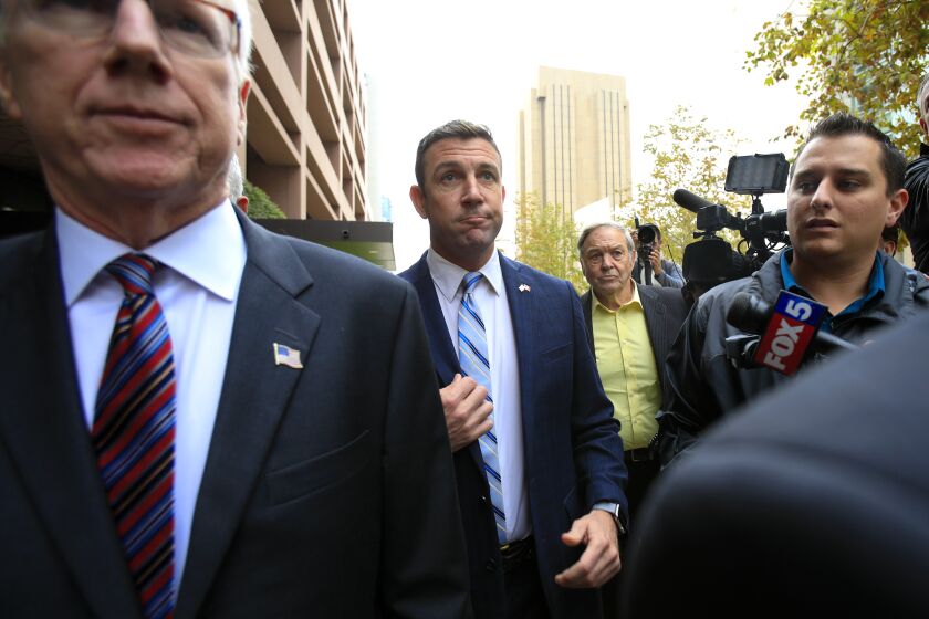On December 3, 2019, outside Federal Court in downtown San Diego, Congressman Duncan Hunter along with his attorney, Paul Pfingst spoke with news reporters briefly about his guilty plea in Federal Court before leaving on December 3, 2019.