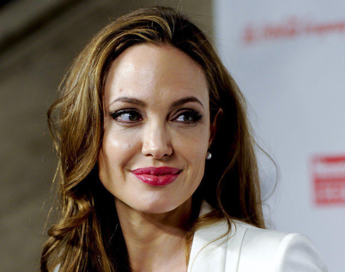 Angelina Jolie, seen at the 2012 Women in the World Summit in New York, says that she has had a preventive double mastectomy after learning she carried a gene that made it extremely likely she would get breast cancer.