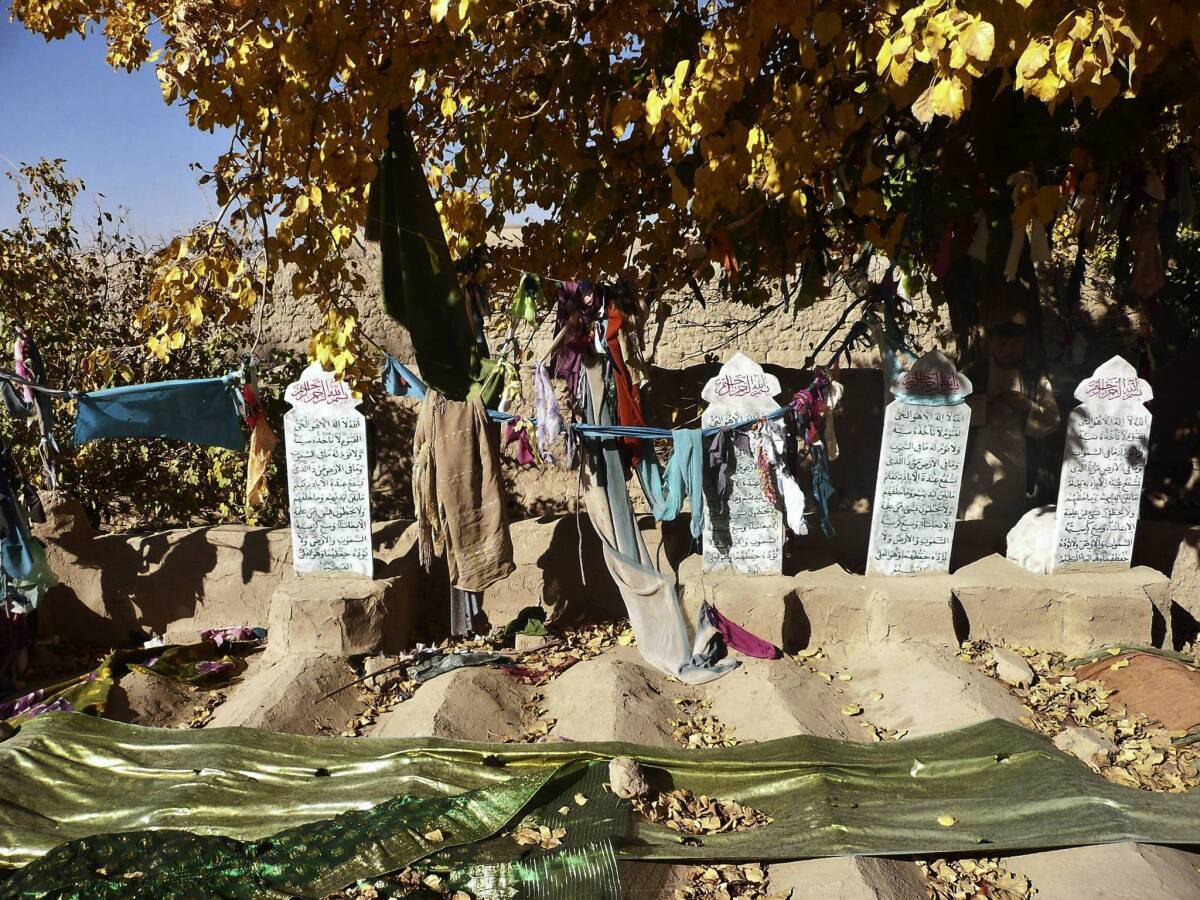 The graves of some of the 16 Afghan villagers killed in Afghanistan's Kandahar province in a massacre in March. U.S. Army Staff Sgt. Robert Bales is accused in the killings.