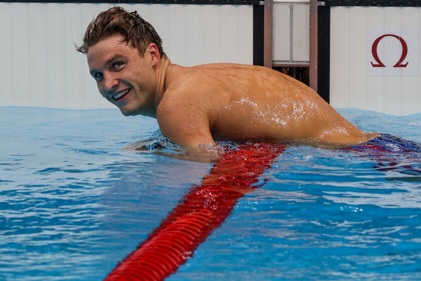 U.S. swimmer Bobby Finke smiles after winning gold in the 800-meter freestyle final Thursday.