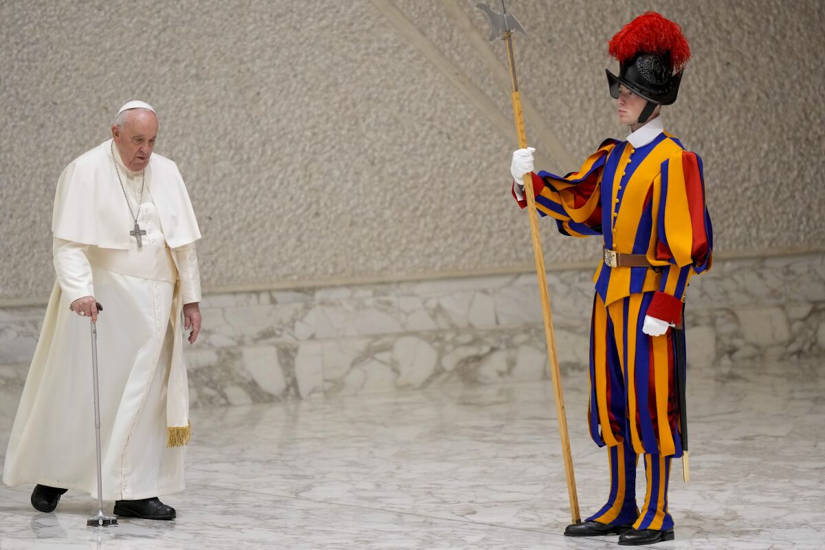 Pope Francis arrives for his weekly general audience in the Pope Paul VI hall at the Vatican, Wednesday, Feb. 22, 2023. (AP Photo/Andrew Medichini)