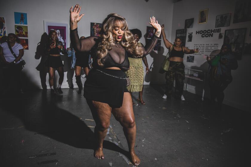 Glendale, CA - June 17: Zorine Truly, creator of Hoochie Con, dances at the Hoochie Con party on Saturday, June 17, 2023 in Glendale, CA. (Jason Armond / Los Angeles Times)