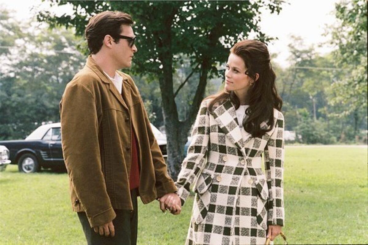 Joaquin Phoenix as Johnny Cash and Reese Witherspoon as June Carter Cash in "Walk the Line."