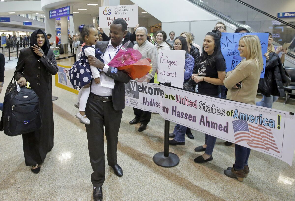 Abdisellam Hassen Ahmed, a Somalian refugee, arrives at Salt Lake City International Airport in 2017.