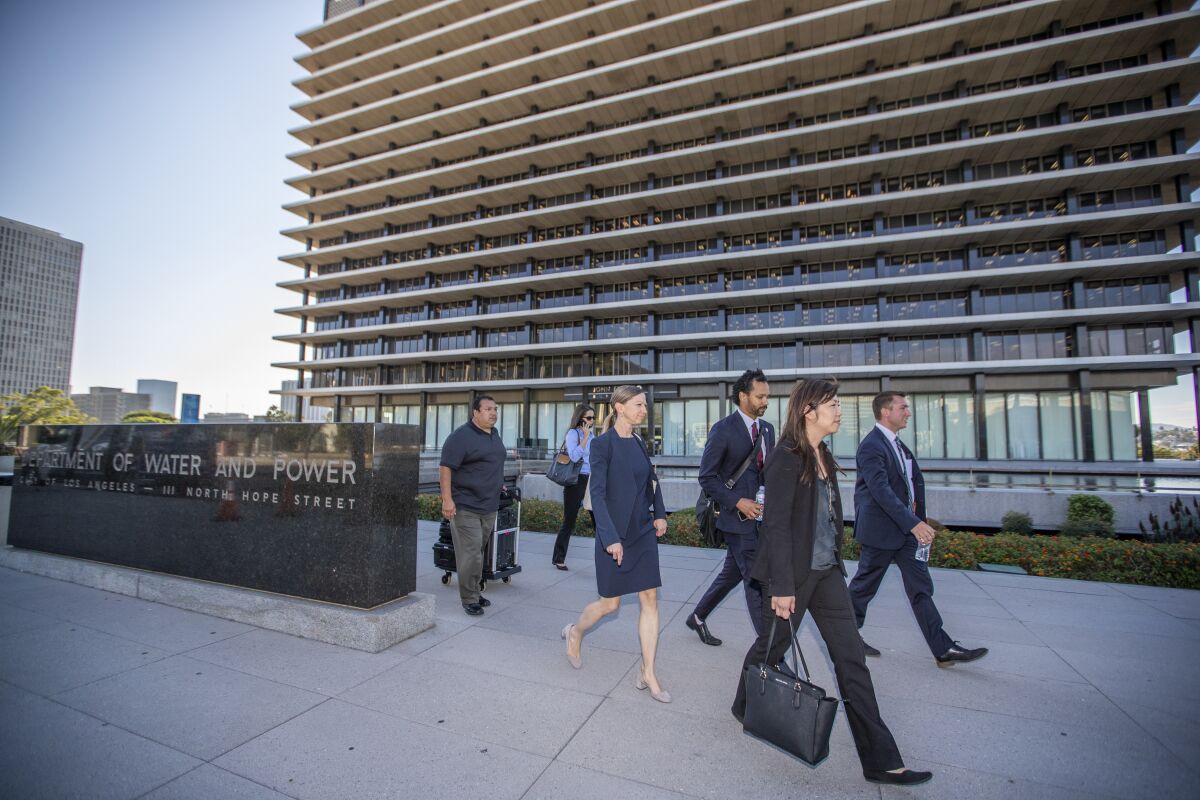 FBI agents leave the downtown headquarters of the Los Angeles Department of Water and Power 