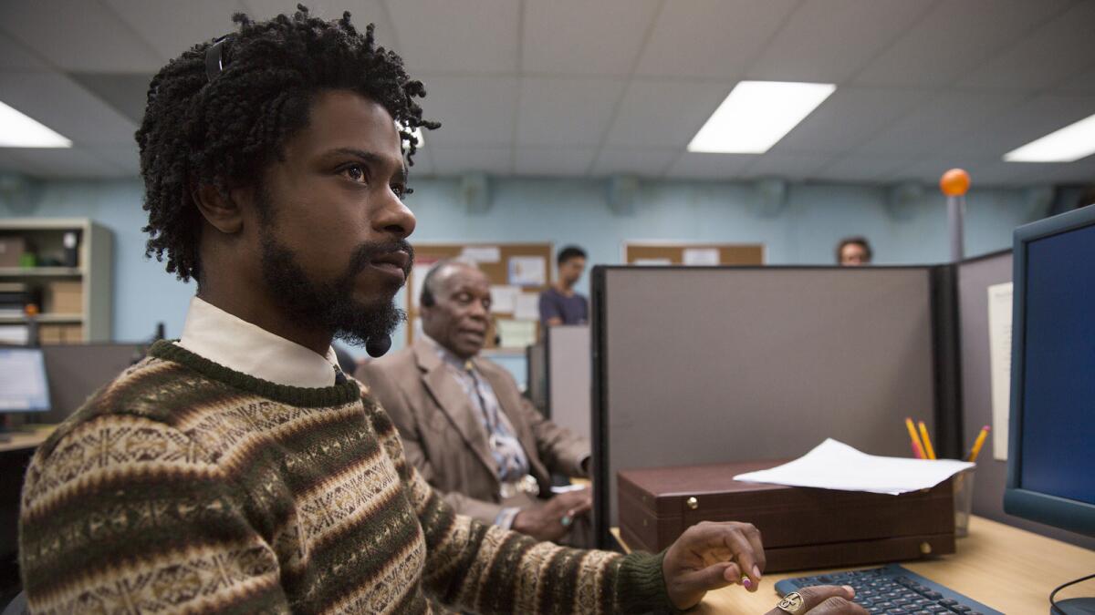 Lakeith Stanfield, left, and Danny Glover in the film "Sorry to Bother You."